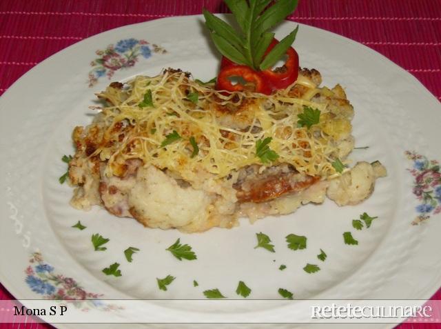 Conopida cu orez si carnati la cuptor