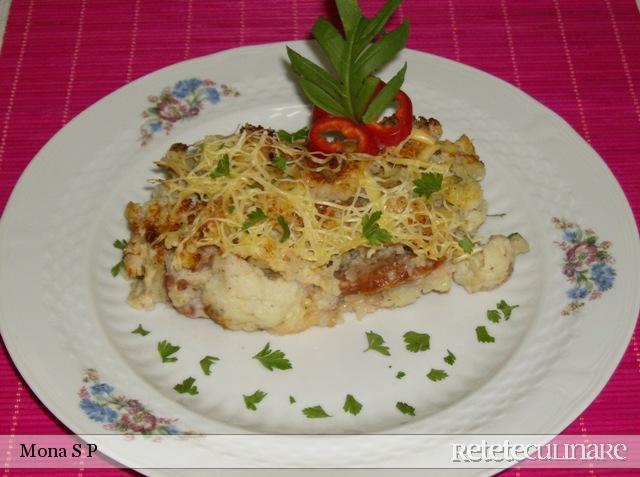 Conopida cu orez si carnati la cuptor