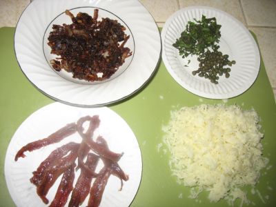 Pizza cu ansoa si ceapa caramelizata
