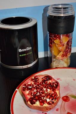 Smoothie cu rodie si portocala